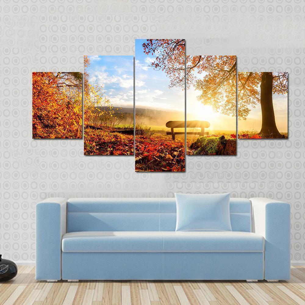 Autumn Landscape With The Sun Warmly Illumining A Bench Under A Tree Nature Canvas Wall Art