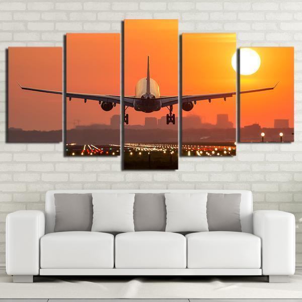 Jet Airplane Taking Off At Sunset Canvas Wall Art