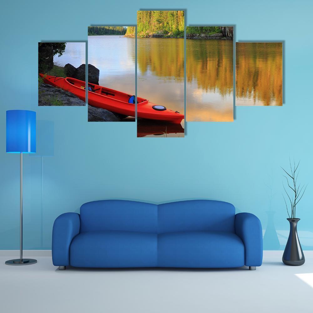 Red Canoe Sitting On Rocks At Lake Nature Canvas Wall Art